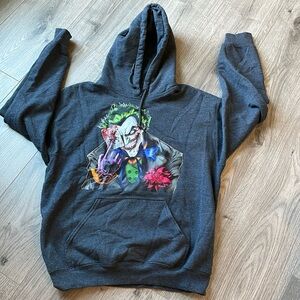Gildan Heavy Blend The Joker Gray Hoodie with front pocket pouch .